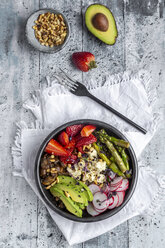 Veggie bowl with quinoa, vegetables, feta, strawberries, avocado, pine nuts and cress - SARF04254