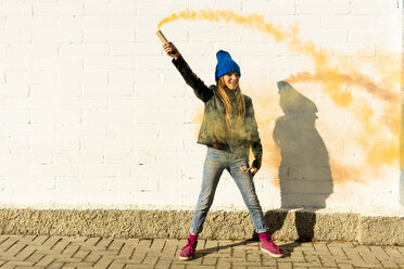 Happy girl with orange smoke torch - ERRF01287