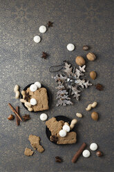 Christmas cookies and Christmas decoration on patterned ground - MYF02106