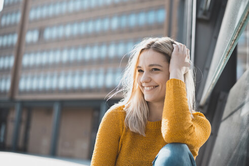 Portrait of happy young woman relaxing - BFRF02014