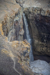 Russia, Kamchatka, half frozen waterfall below Mutnovsky volcano - RUNF01990