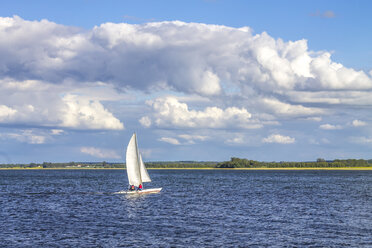 Germany, Mecklenburg Lake District, Waren, sailing boat on lake - PUF01440