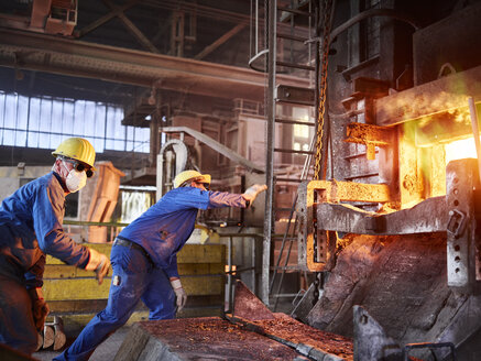 Industry, Smeltery, Workers checking blast furnace for fractures - CVF01193