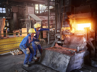 Industry, Smeltery: Workers checking blast furnace for fractures - CVF01196