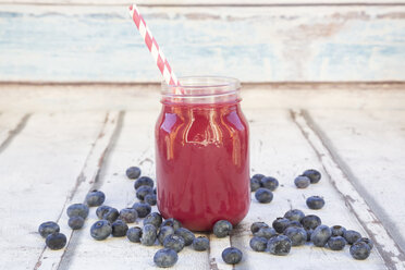 Blueberry smoothie in glass with drinking straws - LVF08018