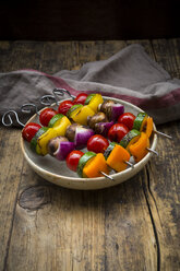 Grilled vegetable skewers on a plate - LVF08030