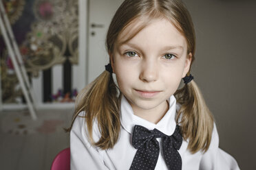 Portrait of a girl wearing bow and shirt - EYAF00240