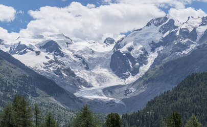 Clouds over snowy mountain range - BLEF03735