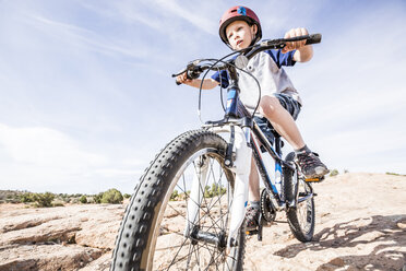 Caucasian boy riding mountain bike - BLEF03827