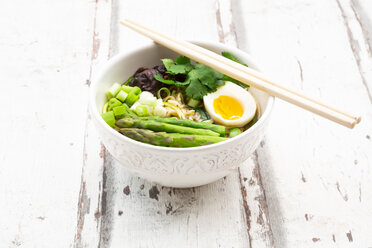 Bowl of Ramen soup with egg, green asparagus, noodles, shitake mushroom and spring onions - LVF08050