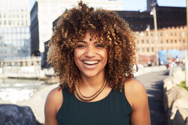 Black woman smiling at waterfront - BLEF04131