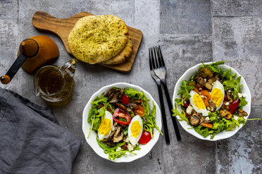 Rocket salad with fried champignons, hard-boiled egg, tomatoes and feta - SARF04287