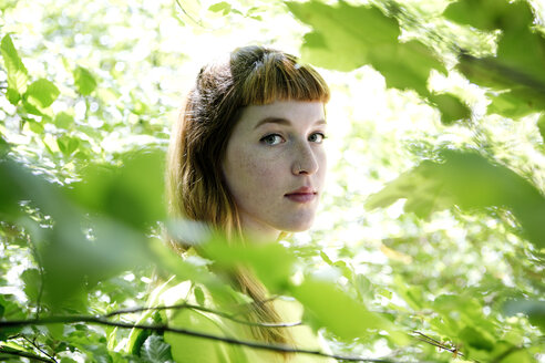 Portrait of young woman in the forest - FLLF00218