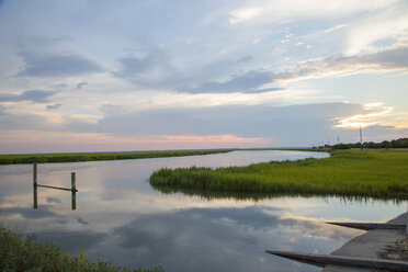 Reflection of clouds in river, Tybee, Georgia, United States - BLEF04507