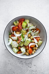 Salad with cucumbers, chickpeas, onion, cherry tomatoes, basil, chia seed - GIOF06354