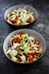 Salad with cucumbers, chickpeas, onion, cherry tomatoes, basil, chia seed - GIOF06357