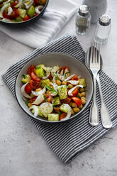 Salad with cucumbers, chickpeas, onion, cherry tomatoes, basil, chia seed - GIOF06359