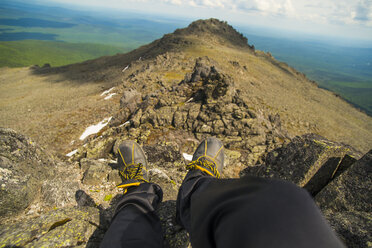 Legs at the edge of mountain - BLEF04730