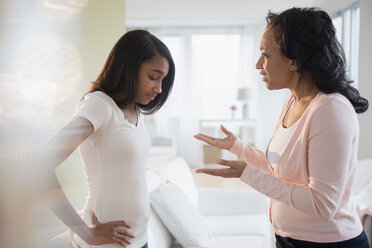 Mother scolding frustrated daughter - BLEF05035