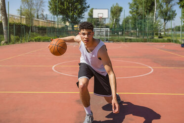 Young man playing basketball - MGIF00502