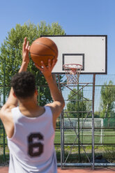 Young man playing basketball - MGIF00510