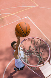 Young man playing basketball - MGIF00531