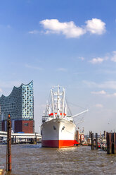 View to Elbe Philharmonic Hall with Cap San Diego ship in the foreground, Hamburg, Germany - PUF01555