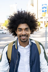 Portrait of smiling casual businessman in the city, Barcelona, Spain - AFVF03044