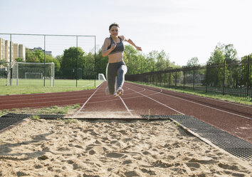 Female athlete training for long jump - AHSF00472