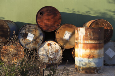 Rusty barrels in a scrapyard - JPTF00083