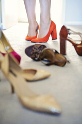 Woman choosing high heels - BLEF06091