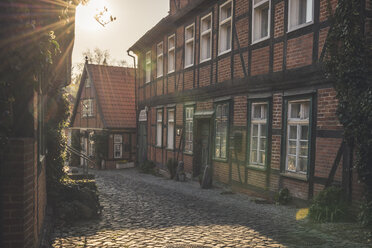 Half-timbered houses in backlight, Lauenburg, Schleswig-Holstein, Germany - KEBF01251