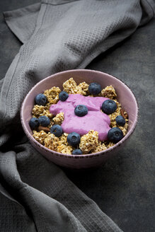 Bowl of Granola with almonds, blueberries and bluebery yoghurt - LVF08072