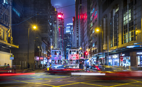 Trams in Hong Kong Central at night, Hong Kong, China stock photo