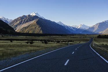 Road in Mount Cook National Park with mountains in the background, South Island, New Zealand - RUNF02461