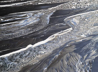 Inverted abstract image of small intertidal stream on beach, sand and water patterns - MINF11419