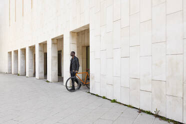 Man with bike - JND00075