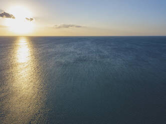 Aerial view of sunset over the sea, Holbox, Yucatan, Mexico - MMAF00956