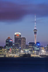Auckland skyline lit up at night, New Zealand - MINF11596