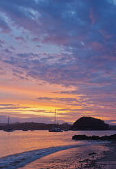 Boats sailing in bay at sunrise, Bay of Islands, Paihia, New Zealand - MINF11614