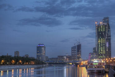 City skyline illuminated at night, Moscow, Russia - MINF11648