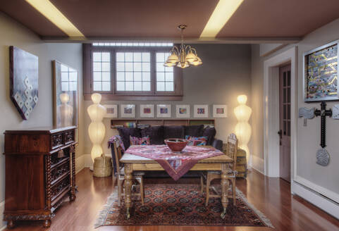 Table, drawers and sofa in living room - MINF11914