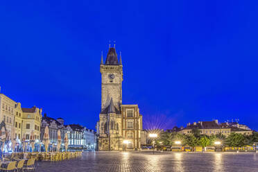 Illuminated piazza and old town hall at dawn, Prague, Czech Republic - MINF12120