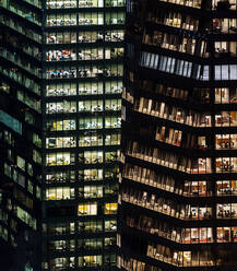 Illuminated highrise buildings at night - MINF12386