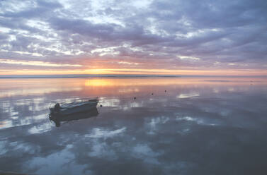 Boat on the Baltic Sea at a sunrise, Curonian Spit, Lithuania - IHF00128