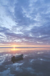 Boat on the Baltic Sea at a sunrise, Curonian Spit, Lithuania - IHF00129