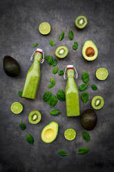 Green smoothie with avocado, spinach, kiwi and lime, coconut flakes and black sesame - LVF08102