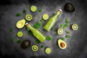 Green smoothie with avocado, spinach, kiwi and lime, coconut flakes and black sesame - LVF08103