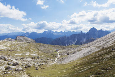 Hiking trail, hikers on trail, Tre Cime di Lavaredo Area, Nature Park Tre Cime, Unesco World Heritage Natural Site, Sexten Dolomites, Italy - GWF06123