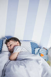 Little boy sleeping on bed in the morning - LJF00138